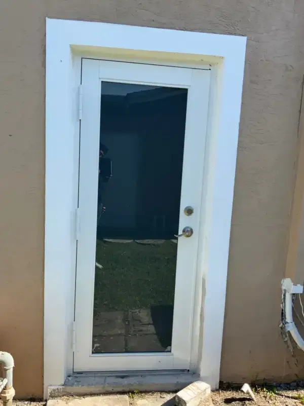White impact entry door with full glass panel in Pinecrest