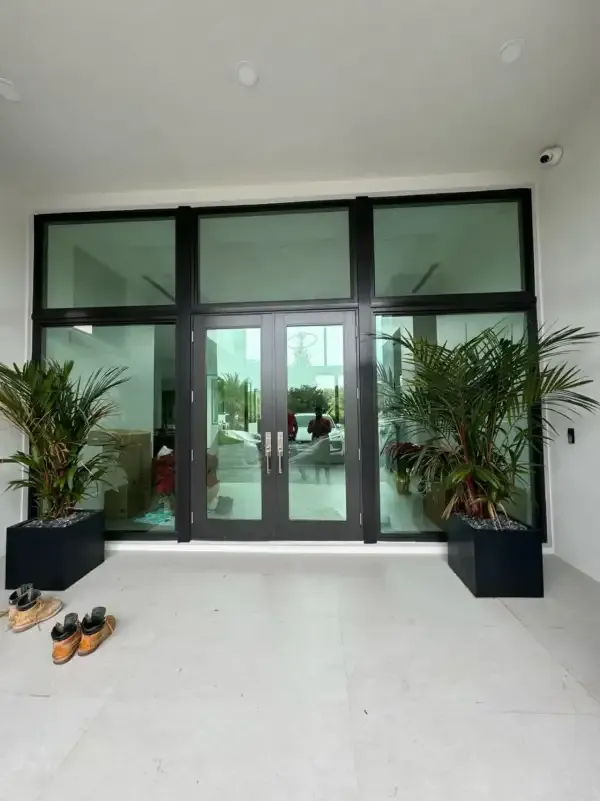 Hurricane impact double doors with transom at a South Florida entryway