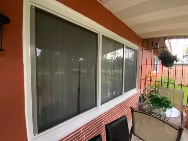 Horizontal impact windows on covered porch in Boynton Beach
